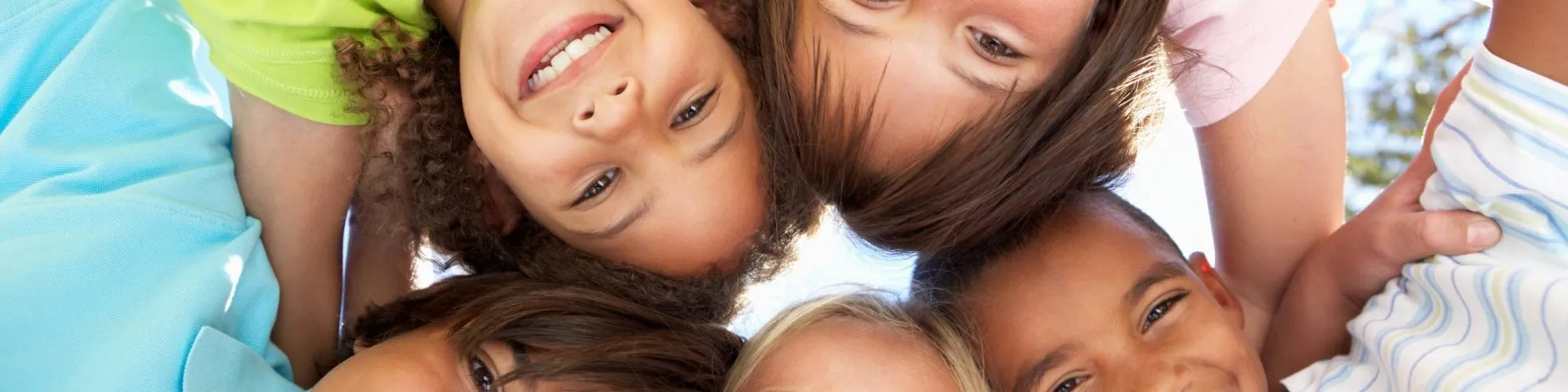 Children in a circle, from below