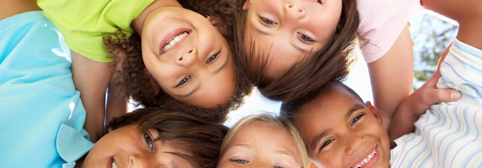 Children in a circle, from below