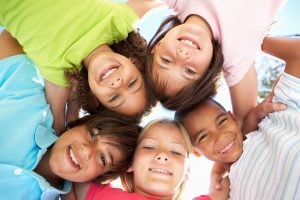 Children in a circle, from below